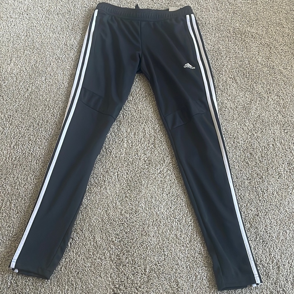 Dark grey and white adidas tapered pants